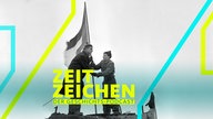 Die beiden Studenten Georg von Hatzfeld (l.) und René Leudesdorff hissen auf der Nordseeinsel Helgoland die Europafahne