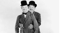 Die Stummfilm-Komiker Stan Laurel (l.) und Oliver Hardy