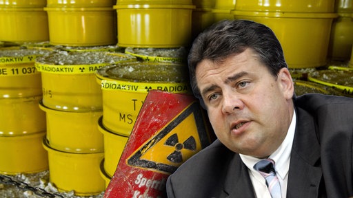 Fotomontage Sigmar Gabriel und gelbe Fässer mit Atommüll