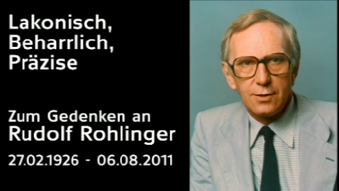 Rechts ein Portraitfoto von Rudolf Rohlinger, links ein Gedenkenspruch
