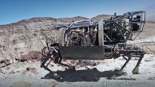 Seitlicher Blick auf einen etwa maultiergroßen, vierbeinigen Roboter.