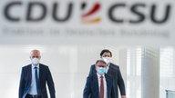 Ralph Brinkhaus und Georg Nüßlein auf dem Weg zur der Pressekonferenz am 03.11.2021