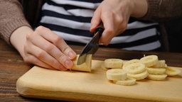Banane schneiden