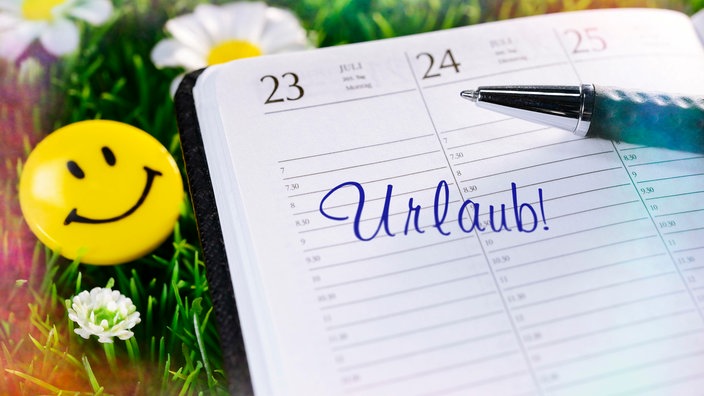 Kalender mit dem Eintrag Urlaub