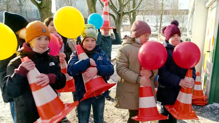 Kinder mit Luftballons