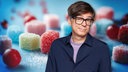 Ralph Caspers mit Zuckerstücken im Hintergrund