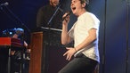 Aufnahme von Lukas Graham auf der Bühne
