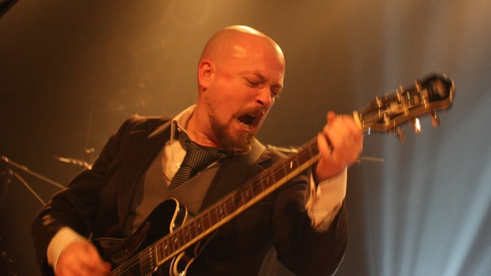 Bandfoto Michael J. Sheehy
