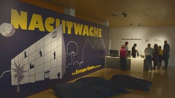 Schriftzug Nachwache an einer Wand