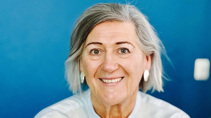 Birgit Köppe-Gaisendrees lächelt in die Kamera.