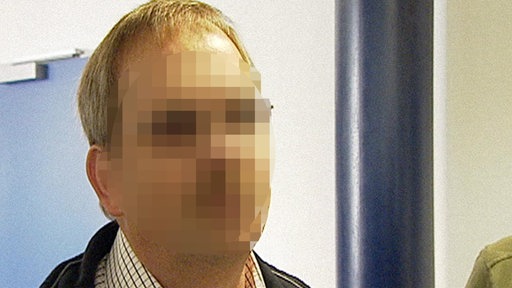 Das verpixelte Gesicht eines Mannes