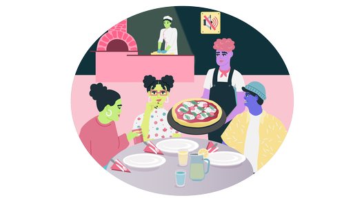 Eine Familie sitzt in einer inklusiven Pizzeria