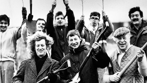 Slade-Sänger Noddy Holder (li.) mit Freunden