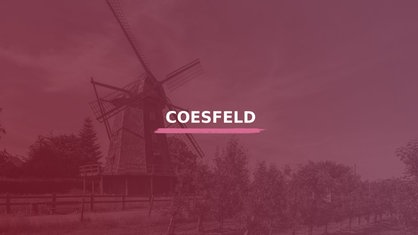 Turmwindmühle. Darauf der Schriftzug "Coesfeld".