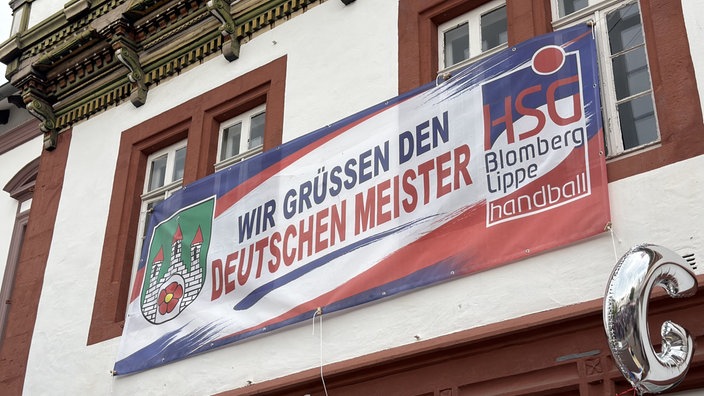 Banner zur Meisterschaftsfeier der Hanballerinnen