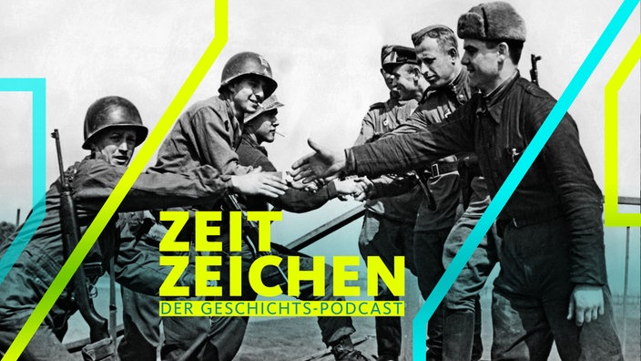 West Meets East On Elbe Bridge Torgau, Germany, April 25, 1945 American troops (left) reach out to grasp hands of soldie