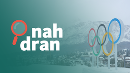 Das Bild zeigt die 5 Olympischen Ringe im Schnee. Im Hintergrund eine Stadt vor einem Berg. Im Vordergrund steht das Logo von "nah dran". 
