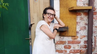Das Beitragsbild des WDR 3 Kulturfeature "Maria und die schweren Jungs von Warschau" zeigt ein Porträt von Marysia