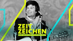 Der US-Musiker Dean Reed mit Gitarre am Mikrofon
