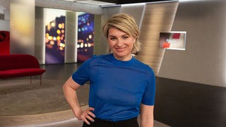 Moderatorin Sabine Heinrich