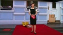 Markt-Moderatorin sitzend im Studio.