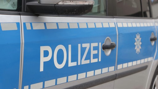 Logo eines Polizei Autos 