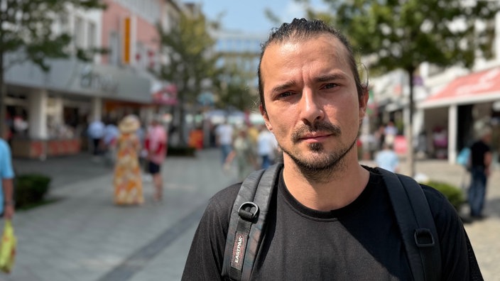 Person schaut in die Kamera