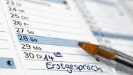 In einem Kalender ist der Termin «14.00 Erstgespräch» für eine Psychotherapie eingetragen
