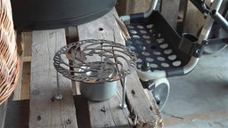 Kochstelle aus einer Brennpaste und einer Fahrradbremsscheibe