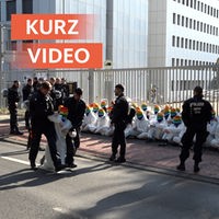 Thumbnail des Kurzvideos, auf dem vermummte Demonstranten in Köln von der Polizei abgeführt werden