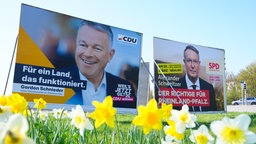 Wahlplakate der Spitzenkandidaten von CDU und SPD zur Landtagswahl in Rheinland-Pfalz