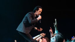Der australische Musiker Nick Cave tritt am 13. November 2024 im Rahmen seiner „Wild God“-Tournee in Dublin auf