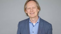 Portrait von Michael Rothgang vom Leibniz-Institut für Wirtschaftsforschung