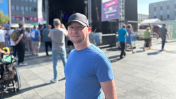 Marcus Marten, ein Mann mit Kappe und blauem Tshirt