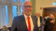 Das Bild zeigt den lächelnden Herrn Sebastian Glatzel.