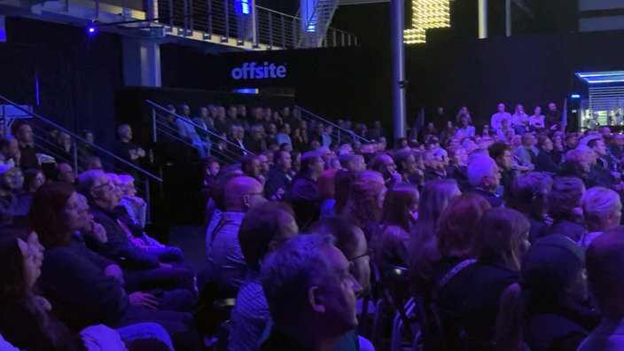 Ausschnitt vom Publikum bei der öffentlichen Verabschiedung von Tobias Groten in der Softwarefirma Tobit, Ahaus. 