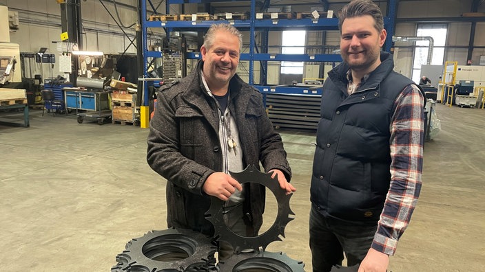 Ralf Ossege und Kevin Stockel aus der Laumann-Geschäftsführung
