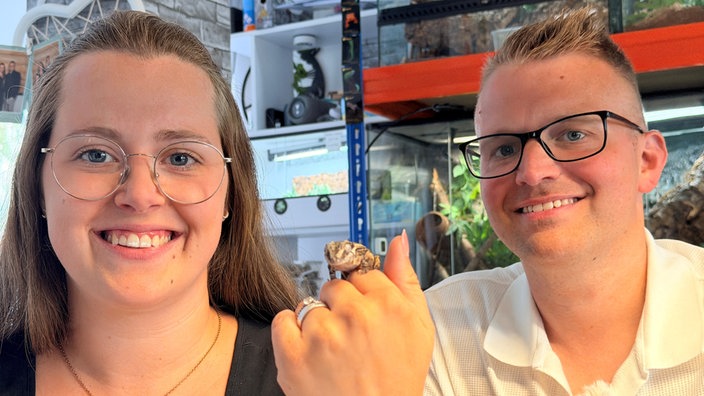 Megan und Christian Scholz lächeln in die Kamera