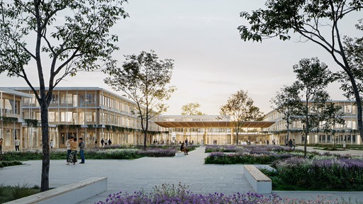Der Krankenhaus-Neubau in Espelkamp, wie ihn sich die Architekten vorstellen. Niedrige Gebäude mit viel Glas und Holz inmitten eines Parks.