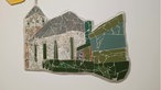 grünes Mosaikbild einer Kirche