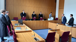 Richter, Anklage und Verteidiger im Saal des Bonner Landgerichts