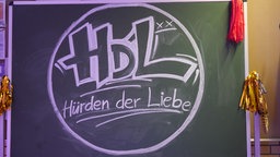 Das Logo des Films Hürden der Liebe, abgekürzt mit HDL