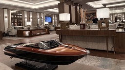 "Living Room" mit kleinem Boot aus Holz im Vordergrund 