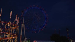 Riesenrad bei Drohnenshow auf der Rheinkirmes