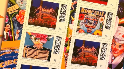 Bunte Sonderbriefmarken, die Motive aus dem Circus Roncalli zeigen
