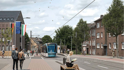 Auf dem Bild ist eine Fotomontage von einer Straßenbahn zu sehen, die durch Baesweiler fährt.