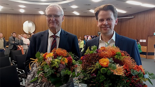 Die Kandidaten im Portrait - rechts Arne von Boetticher (CDU), links Robert Winkels (SPD)