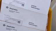 Mehrere Briefwahlunterlagen an Max Mustermann