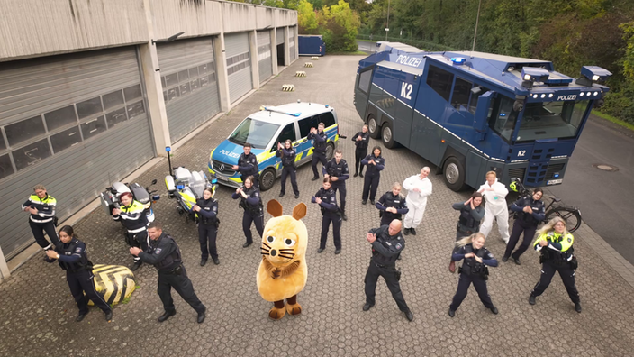 Die Maus tanzt gemeinsam mit der Polizei Köln