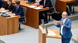 SPD-Fraktionschef Ott bei einer Landtagsdebatte. Ministerpräsident Wüst (CDU) auf der Regierungsbank